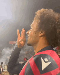 Joshua Zirkzee Being Goofy Peace Sign GIF