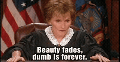 Judge At Desk Says Beauty Fades Dumb Is Forever GIF