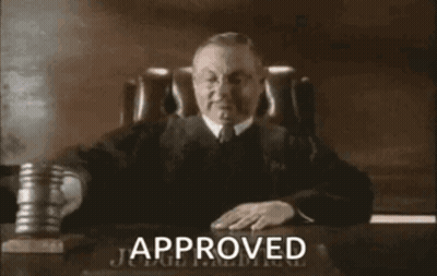 Judge At Desk With Approved Sign GIF