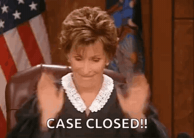Judge Holding Hands Up In Courtroom Saying Case Closed GIF