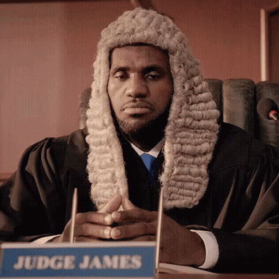 Judge James Sitting At Desk GIF