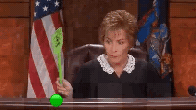 Judge Playing With Green Tennis Ball At Bench GIF