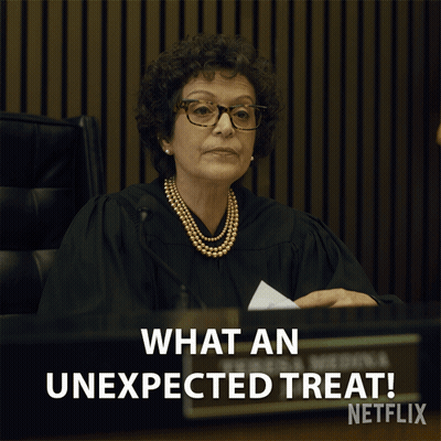 Judge Sitting At Desk Saying What An Unexpected Treat Netflix GIF