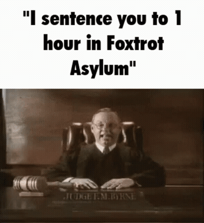Judge Sitting At Desk With Gavel And Hammer GIF