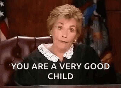 Judge Sitting At Table Making Face GIF