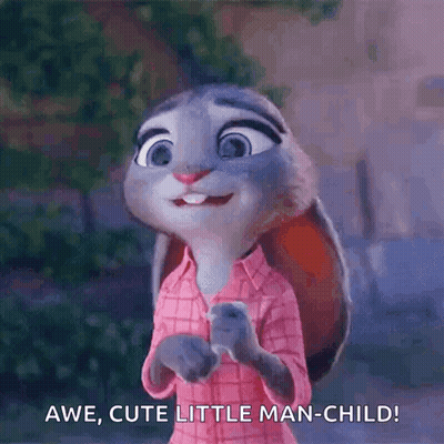 Judy Hopps From Zootopia Is Smiling And Holding A Cell Phone While Wearing A Pink Shirt . GIF
