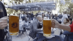 Jugs With Beer At Oktoberfest GIF