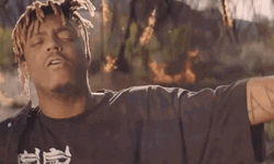 Juice Wrld Singing In Fire Place GIF