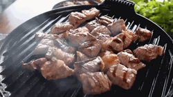 Juicy Cubed Meat Grilling To Perfection GIF