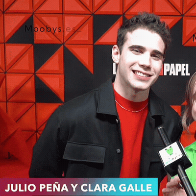 Julio Peña And Clara Galle Being Interviewed GIF