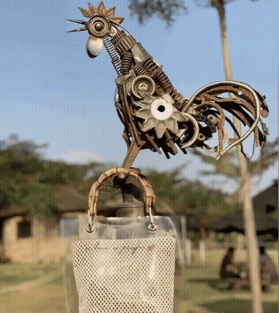 Junk Rooster Statue GIF