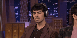 Just Vibing On The Beat Nodding Head GIF