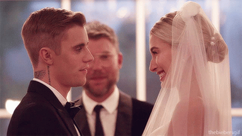 Justin Bieber And Hailey Baldwin Are Looking At Each Other GIF
