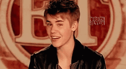 Justin Bieber Doing Eye Winking And Smiling GIF