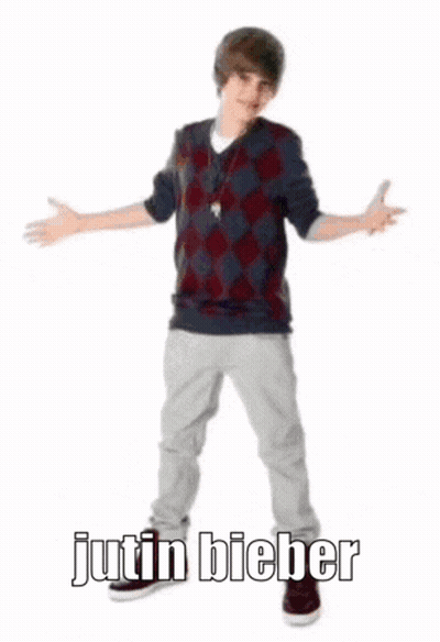 Justin Bieber Holding A Basketball In His Hand GIF