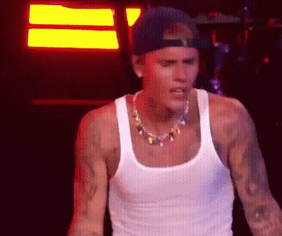 Justin Bieber In White Tank Top And Cap GIF