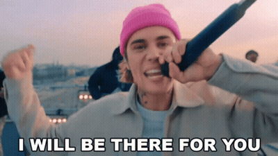 Justin Bieber Singing Into A Microphone With The Words " I Will Be There For You " GIF