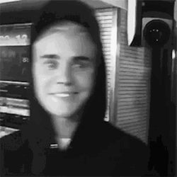 Justin Bieber Smiling In A Wearing Black Hoodie GIF