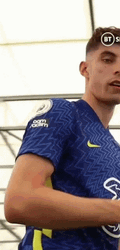 Kai Havertz Flexing His Team Logo On His Shirt GIF