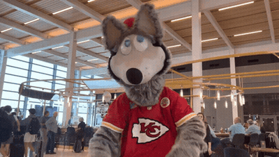 Kansas City Chiefs Mascot In Red And Yellow Jersey GIF