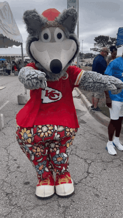 Kansas City Chiefs Mascot In Red Shirt And Floral Pants GIF