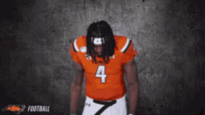 Kansas Football Player Number 4 Hands In Pockets GIF
