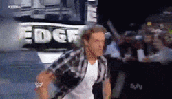Kante WWE Edge Dives Inside Ring GIF