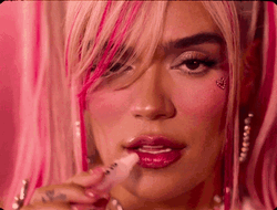 Karol G Lip Gloss Application GIF