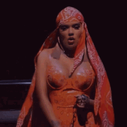 Karol G Night Shoot Orange Outfit GIF