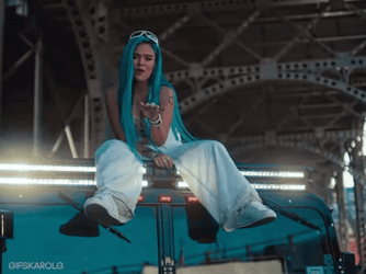 Karol G Sitting On A Light GIF