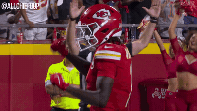 KC Football Player Celebrating Touchdown With Cheerleaders GIF