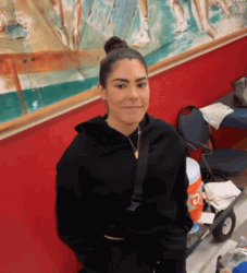 Kelsey Plum Revealing Hands From Pockets GIF