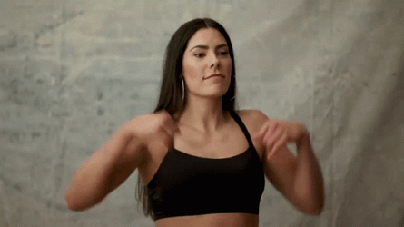 Kelsey Plum Showing Off Her Arm Muscles GIF