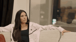 Kelsey Plum Sitting On A Couch GIF