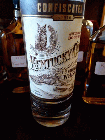 Kentucky 10 Bourbon Whiskey Bottle With Cat Label GIF