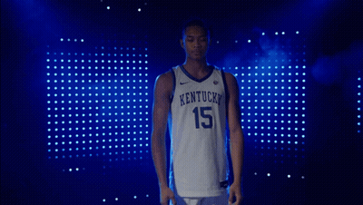 Kentucky Basketball Player In Front Of Blue Backdrop GIF