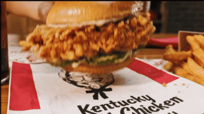 Kentucky Chicken Sandwich Served On Paper GIF