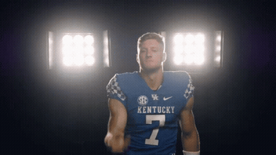 Kentucky Football Player In Blue Jersey Number 7 GIF