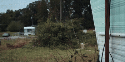 Kenworth Semi Truck Driving Down Road GIF