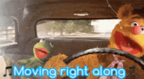 Kermit The Frog And Fozzie Bear Are Driving A Car With The Words Moving Right Along Behind Them GIF