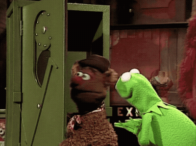 Kermit The Frog And Fozzie Bear Are Looking Out Of A Green Box GIF