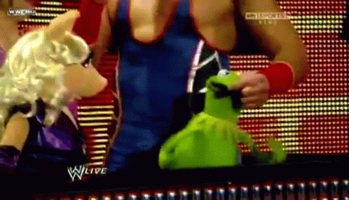 Kermit The Frog Held By Wrestler GIF