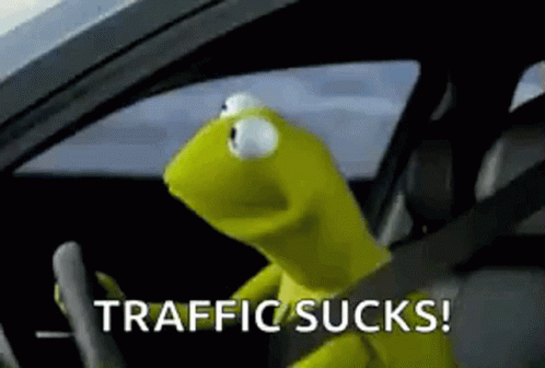 Kermit The Frog Is Driving A Car And Saying `` Traffic Sucks ! '' GIF