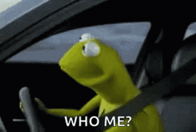 Kermit The Frog Is Driving A Car And Saying `` Who Me '' . GIF