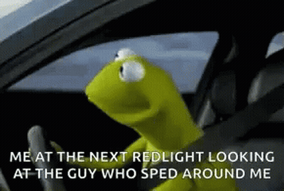 Kermit The Frog Is Driving A Car And Talking About The Next Red Light Looking At The Guy Who Sped Around Me . GIF