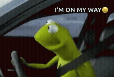 Kermit The Frog Is Driving A Car With The Words I 'M On My Way Above Him GIF