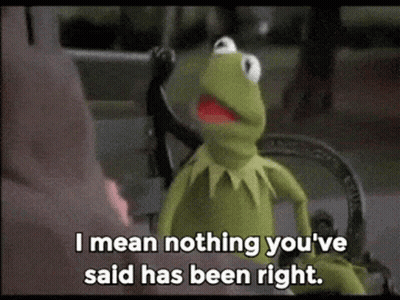 Kermit The Frog Is Sitting On A Bench And Talking To A Person . GIF