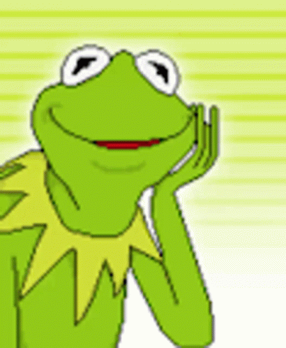 Kermit The Frog Is Smiling And Looking At The Camera . GIF