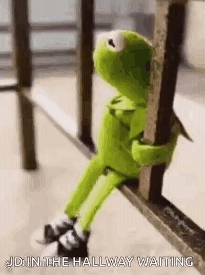 Kermit The Frog Sitting On Railing Waiting GIF
