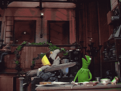 Kermit The Frog Smoking At Table GIF